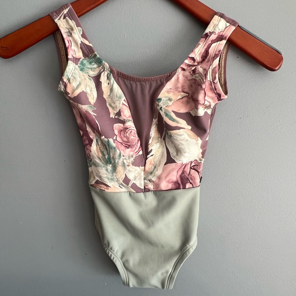 Beautiful floral Lucky Leo leotard with mesh V-neck. Great condition!